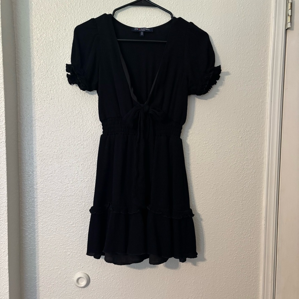 Ruffled Black Dress with Bow